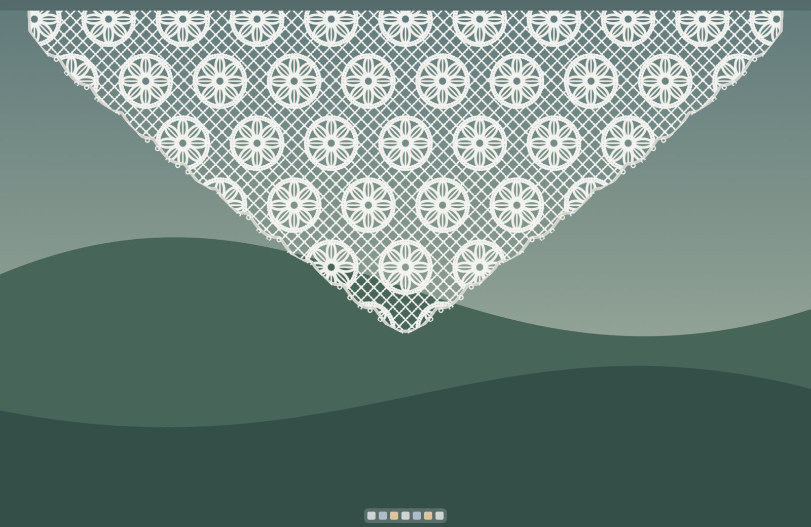 A different Dantel lace pattern draped over a Mac desktop