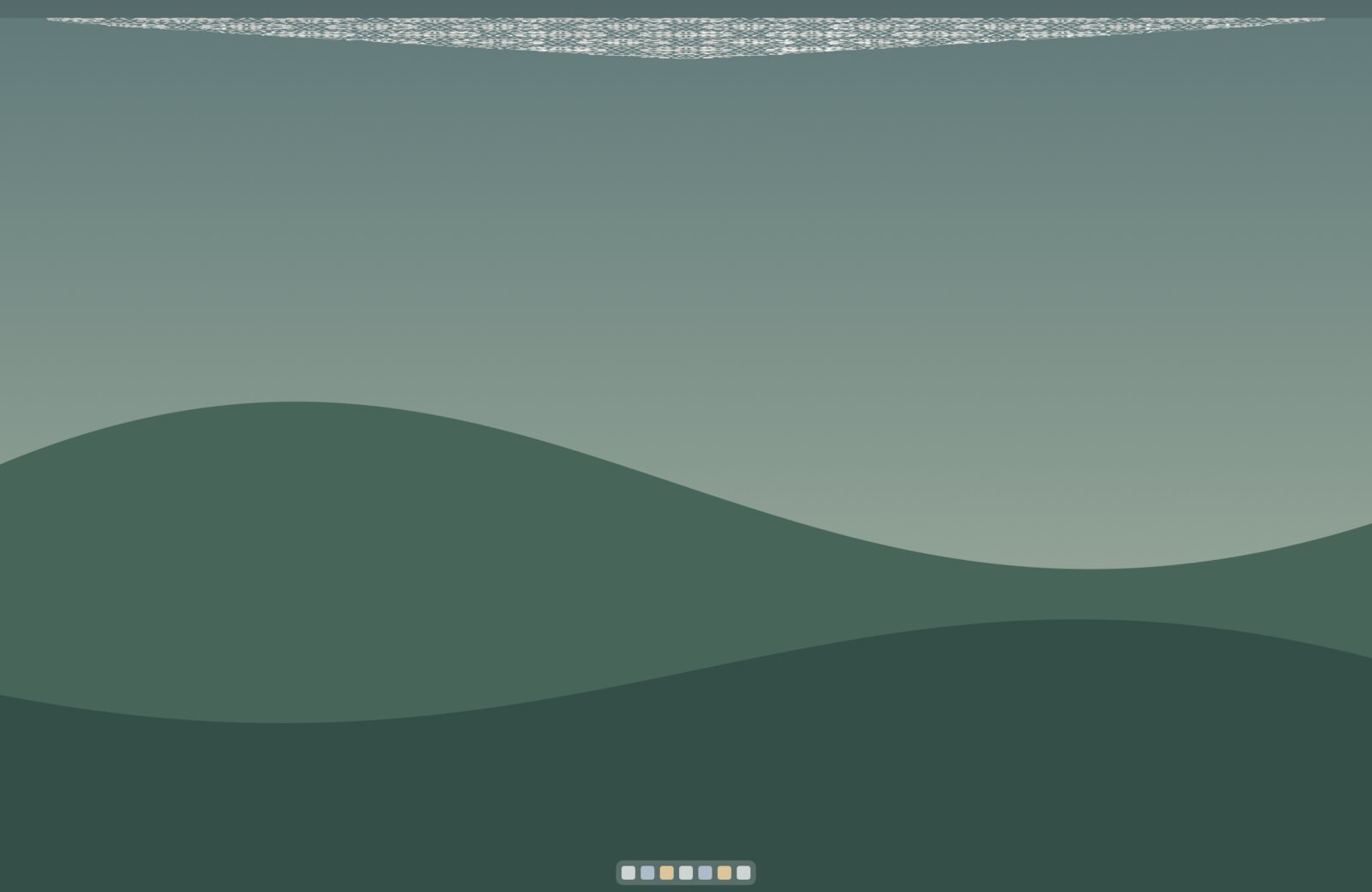 Dantel folded at the top of the Mac screen
